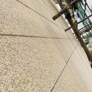 营口 黄金麻花岗岩荔枝面外墙干挂石材效果示例