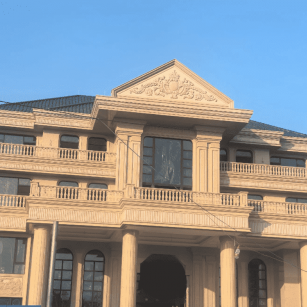 营口黄金麻别墅外墙干挂石材效果示例